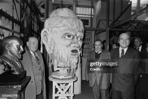 Photo taken on March 22, 1975 shows director of the Cinémathèque Française Henri Langlois and French Secretary of State for Culture Michel Guy...