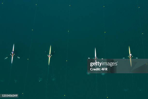 rowing, lake bled, slovenia - rowing aerial stock pictures, royalty-free photos & images