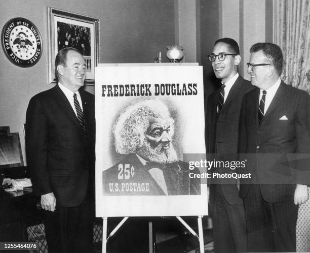 View of, from left, American politician and US Vice President Hubert H Humphrey , lawyer Roland B Scott Jr, and US Postmaster General Larry O'Brien...