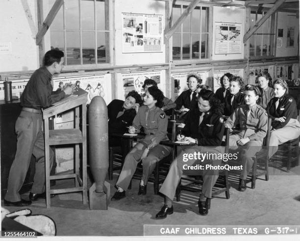 View of Women's Air Force Service pilots as they receive ground school instruction in a classroom at Childress Army Air Field, Childress, Texas,...