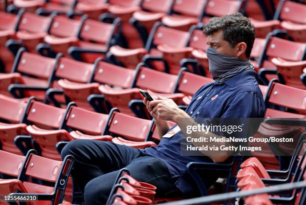 Chaim Bloom, chief baseball officer for the Boston Red Sox watches the intrasquad scrimmage during Summer Camp at Fenway Park on July 10, 2020 in...