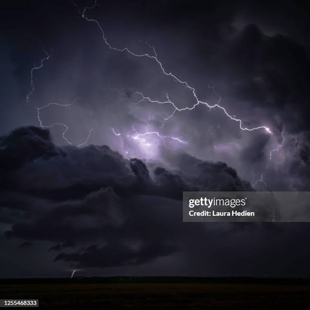 storms and farm equipment - lightning purple stock pictures, royalty-free photos & images