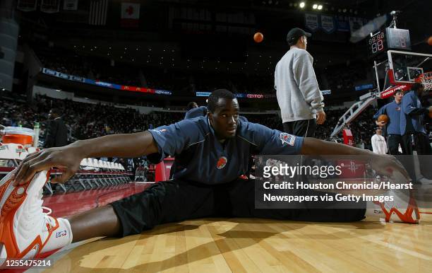 The Charlotte Bobcats Emeka Okafor streatches before Wednesday's NBA game between the Houston Rockets and the Charlotte Bobcats at the Toyota Center...