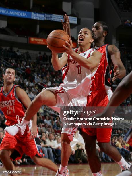 The Houston Rockets Tyronn Lue misses a shot during the third quarter of Wednesday's NBA game against the Charlotte Bobcats at the Toyota Center in...