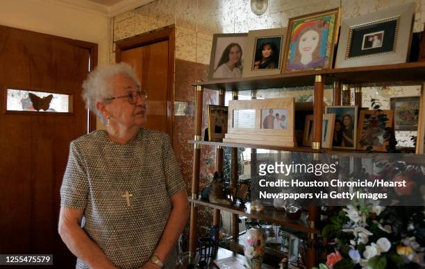 Jutta Kennedy the mother of Andrea Yates looks at a self portriat drawn by Yates while in prison, in her home in Houston,Texas January 6,2005. James...