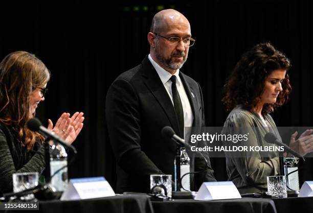 Iceland's Prime Minister Katrin Jakobsdottir, Ukraine's Prime Minister Denys Shmyhal and Icelandic Foreign Minister Thordis Kolbrun Reykfjord...