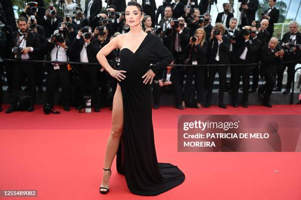 British actress Amy Jackson arrives for the screening of the film "Kaibutsu" during the 76th edition of the Cannes Film Festival in Cannes, southern...