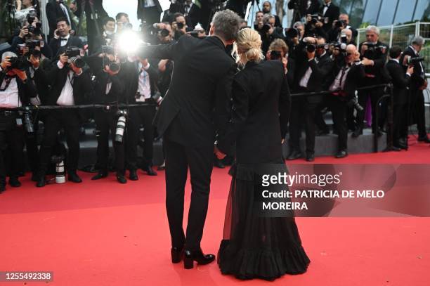 Actor Ethan Hawke arrives with his wife Ryan Shawhughes for the screening of the film "Extrana Forma de Vida" during the 76th edition of the Cannes...
