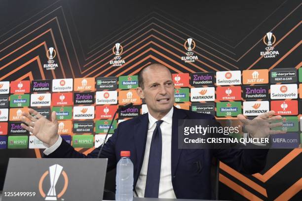 Juventus' Italian coach Massimiliano Allegri gestures as he gives a press conference on the eve of the UEFA Europa League semi-final second leg...