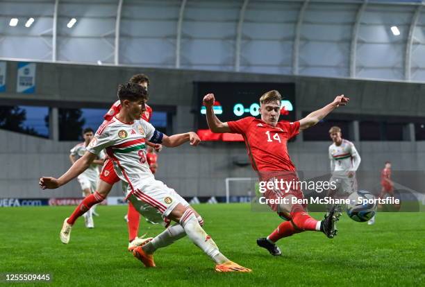 Martin Kern of Hungary in action against Joshua Beecher of Wales during the UEFA European Under-17 Championship Finals 2023 Group A match between...
