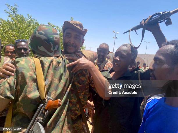 Sudanese army chief Gen. Abdel Fattah al-Burhan is seen together with his soldiers as clashes between the Sudanese Armed Forces and the paramilitary...