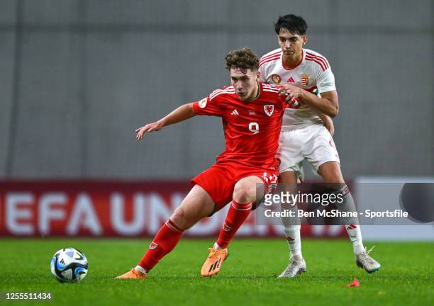 Iwan Morgan of Wales in action against Ádám Umathum of Hungary during the UEFA European Under-17 Championship Finals 2023 Group A match between...