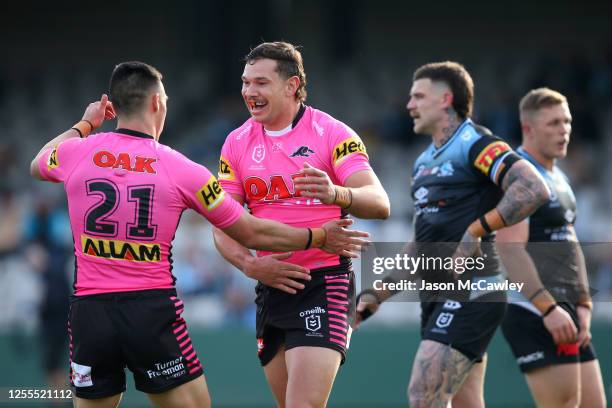 Brent Naden of the Panthers celebrates scoring a try during the round nine NRL match between the Cronulla Sharks and the Penrith Panthers at...