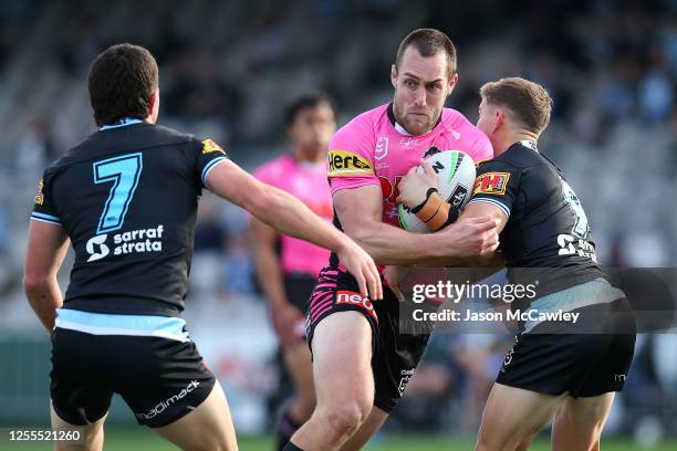 Issah Yeo of the Panthers is tackled during the round nine NRL match between the Cronulla Sharks and the Penrith Panthers at Netstrata Jubilee...