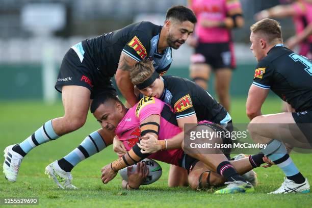 Stephen Crichton of the Panthers is tackled during the round nine NRL match between the Cronulla Sharks and the Penrith Panthers at Netstrata Jubilee...