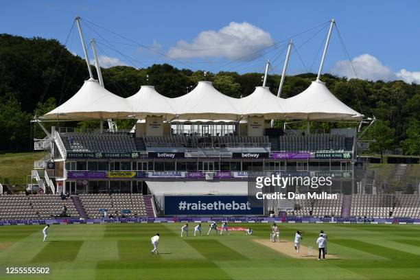 General view as Kemar Roach of the West Indies bowls to Dom Sibley of England during day four of the 1st #RaiseTheBat Test match at The Ageas Bowl on...