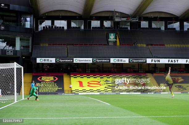 Troy Deeney of Watford scores his team's second goal from a penalty during the Premier League match between Watford FC and Newcastle United at...