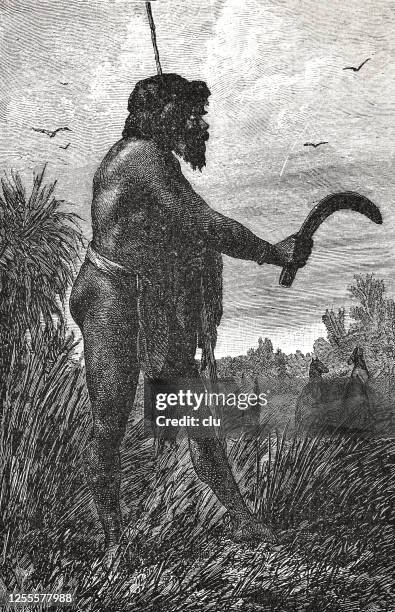 australian boomerang thrower - australian aboriginal culture stock illustrations