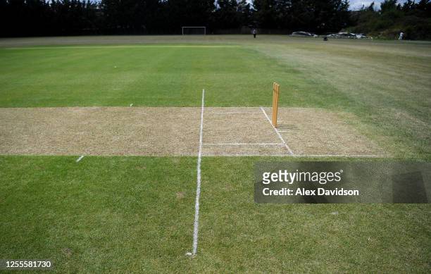 Detailed view of extended crease markings in so batsman can run whilst being socially distant from the bowler at Indian Gymkhana Cricket Club on July...