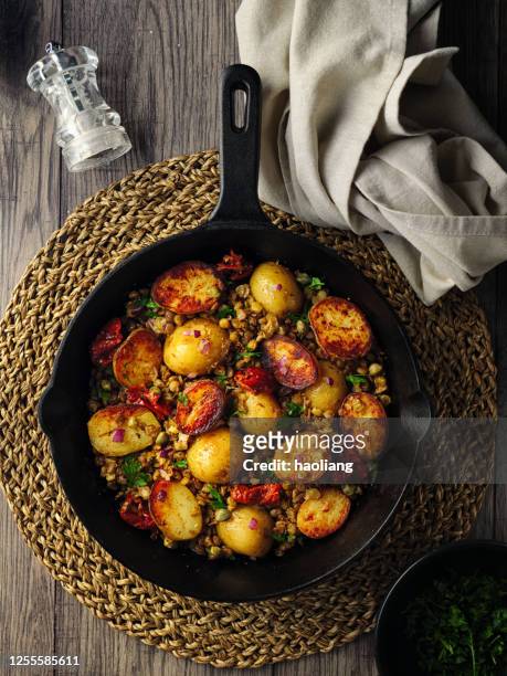 healthy warm vegan potato salad - prepared potato stock pictures, royalty-free photos & images