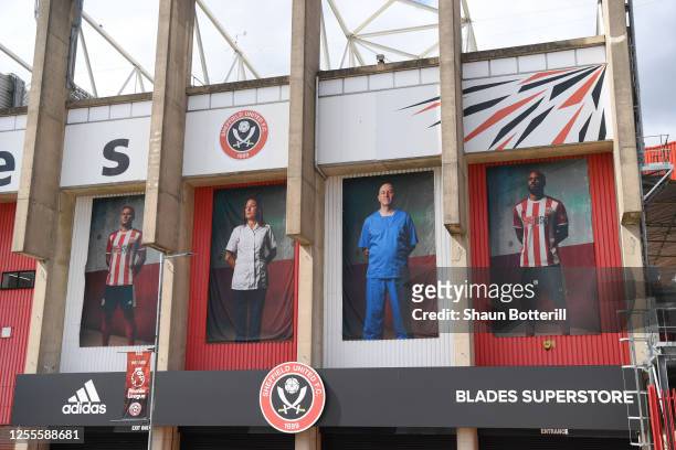 General view outside the stadium, as images of NHS staff are displayed, ahead of the Premier League match between Sheffield United and Chelsea FC at...