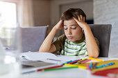 Boy having problems with homework