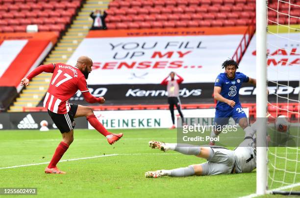 David McGoldrick of Sheffield United scores his team's first goal past Kepa Arrizabalaga of Chelsea during the Premier League match between Sheffield...