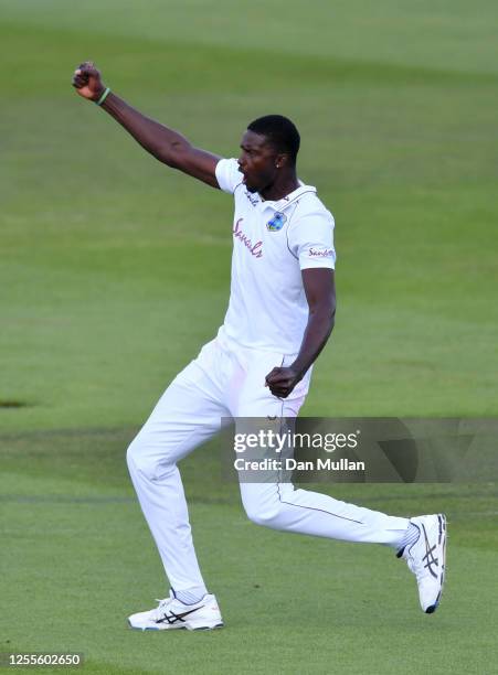 West Indies captain Jason Holder celebrates dismissing England captain Ben Stokes during day four of the 1st #RaiseTheBat Test match at The Ageas...