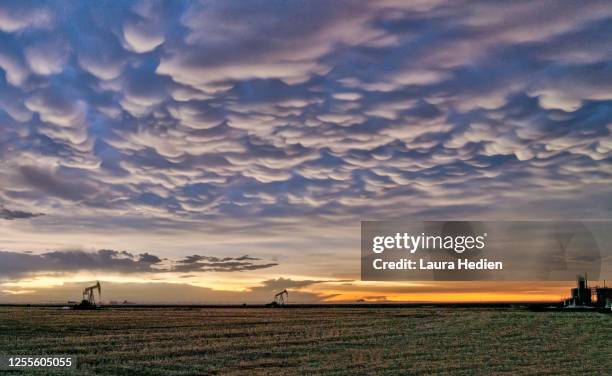 storms on the great plains - mammatus cloud stock pictures, royalty-free photos & images