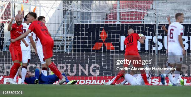 Stefan Kutschke of Ingolstadt scores his teams first goal during the 2. Bundesliga playoff second leg match between FC Ingolstadt and 1. FC Nürnberg...