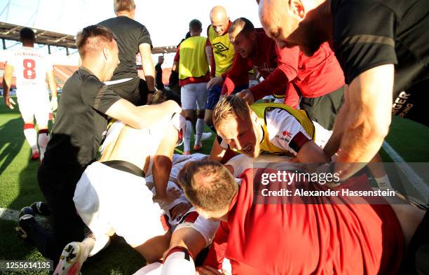 Fabian Schleusener of Nuremberg celebrates after scoring his teams first goal during the 2. Bundesliga playoff second leg match between FC Ingolstadt...