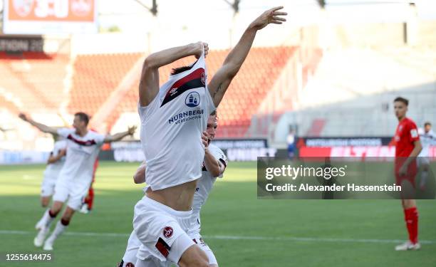 Fabian Schleusener of Nuremberg celebrates after scoring his teams first goal during the 2. Bundesliga playoff second leg match between FC Ingolstadt...