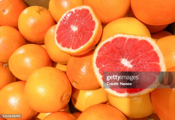 fresh grapefruit background - グレープフルーツ ストックフォトと画像
