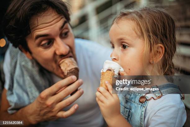 it's sweet like you are - girl eating messy ice cream cone stock pictures, royalty-free photos & images