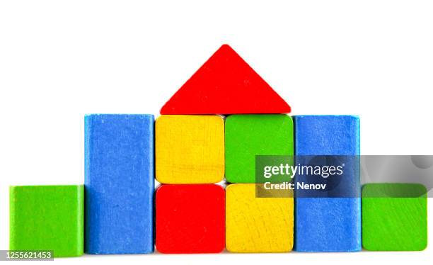 wooden building blocks on white background - building block isolated stock pictures, royalty-free photos & images