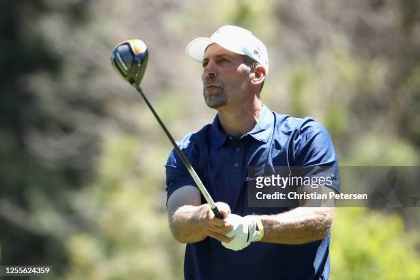 Former MLB athlete John Smoltz plays a tee shot on the ninth hole during round two of the American Century Championship at Edgewood Tahoe South golf...