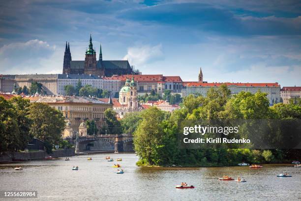 prague castle and lesser town with vltava river in foreground - hradcany castle stock pictures, royalty-free photos & images