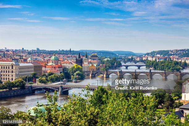 aerial view of prague's old town and lesser town divided by vltava river - empty prague stock pictures, royalty-free photos & images