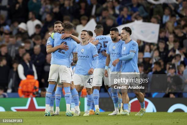 Players of Manchester City celebrate after winning the UEFA Champions League semi-final second leg match against Real Madrid at Etihad Stadium on May...