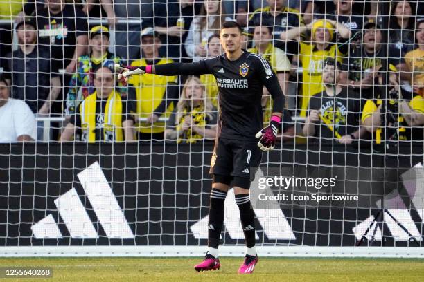 Pedro Gallese of Orlando CitJonathan Bond of Los Angeles Galaxy looks on during the first first half against the Columbus Crew at Lower.com Field in...