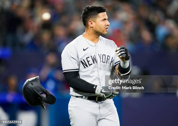 Gleyber Torres of the New York Yankees reacts to striking out against the Toronto Blue Jays in the fifth inning during their MLB game at the Rogers...