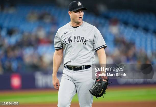 Gerrit Cole of the New York Yankees reacts against the Toronto Blue Jays in the sixth inning during their MLB game at the Rogers Centre on May 17,...