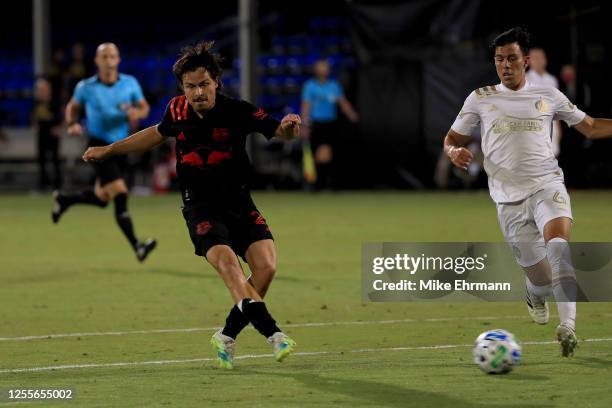 Florian Valot of New York Red Bulls scores a goal in the fourth minute against Brad Guzan of Atlanta United during a match in the MLS Is Back...