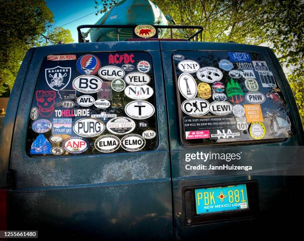 santa fe, nm:  travel stickers on old van - bumper sticker stock pictures, royalty-free photos & images