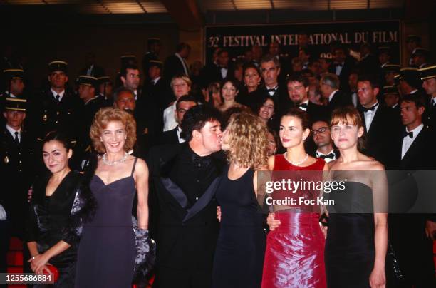 Guest, Marisa Paredes, Pedro Almodovar, Cecilia Roth, Penelope Cruz, and Antonia San Juan attend the 52th Cannes Film Festival on May 1999 in Cannes,...