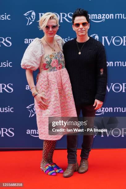 Kelly Jones from The Stereophonics and wife Jakki Healy arriving for the annual Ivor Novello Awards at Grosvenor House in London. Picture date:...