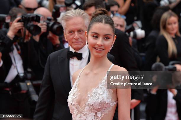 May 2023, France, Cannes: Michael Douglas and daughter Carys Zeta Douglas arrive at the opening night film "Jeanne du Barry" of the 76th Cannes Film...