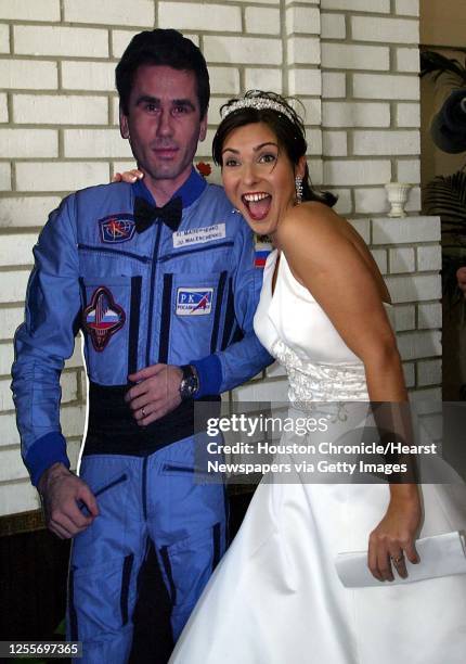 Ekaterina Dmitriev the bride of Russian cosmonaut Yuri Malenchenko with a life size cut out of her new husband at a press conference in Seabrook,...