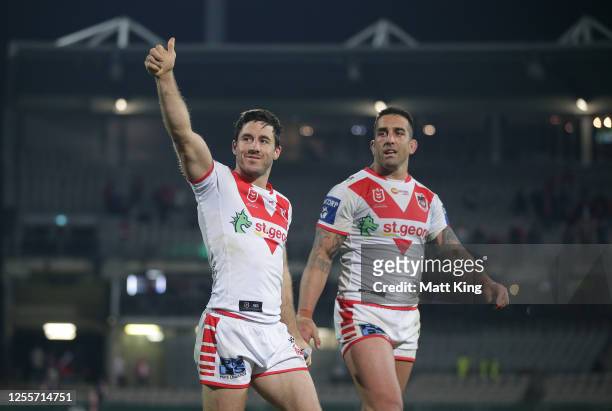 Ben Hunt and Paul Vaughan of the Dragons celebrate victory after the round nine NRL match between the St George Illawarra Dragons and the Manly Sea...