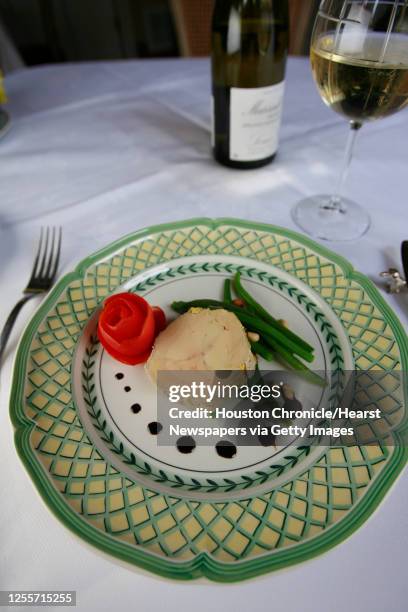 The "Terrine de Foie Gras" with tiny green beans, balsamic vinegar reduction and pine nuts at Chez Georges restaurant in Houston, Texas July 27,2006....